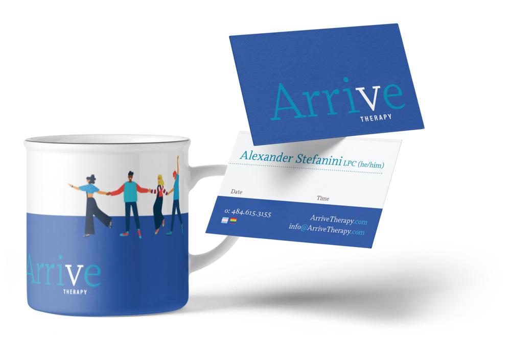 A mug and business cards featuring the Arrive Therapy logo